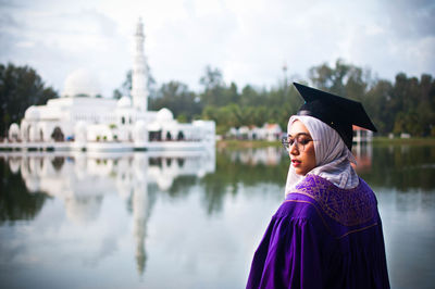 Portrait of man standing in lake