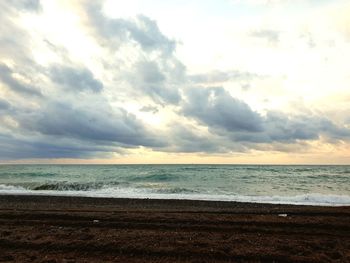 Scenic view of beach against sky