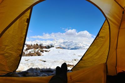 Scenic view of snowcapped mountains against sky