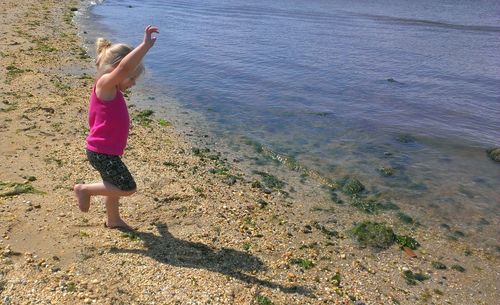 Woman standing on beach