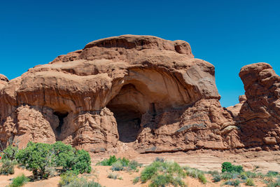 Rock formations against blue sky