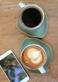 High angle view of coffee on table