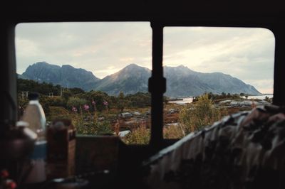 View of mountain range against cloudy sky