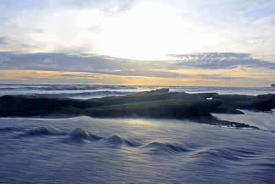 Scenic view of sea against sky during sunset