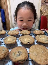 Close-up portrait of girl having food