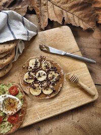 High angle view of eggs on cutting board