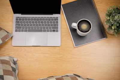 High angle view of laptop on table