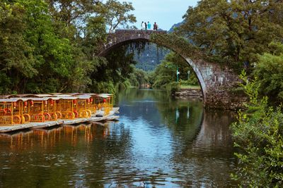 Bridge over river against sky