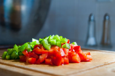 Close-up of diced peppers on cutting board