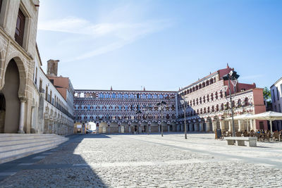 Buildings in city against sky