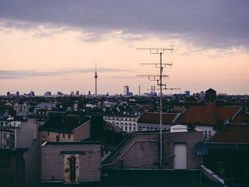 Cityscape against sky during sunset