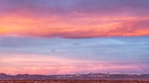 Scenic view of dramatic sky during sunset