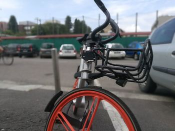 Close-up of bicycle on road