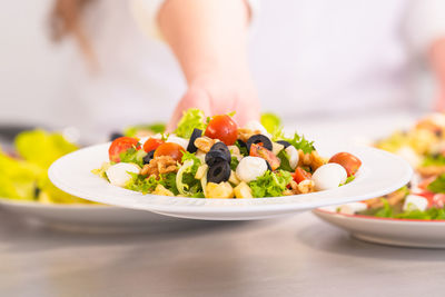 Close-up of fruits in plate on table