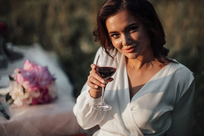 Close-up of a woman drinking glass