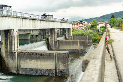 Bridge over river against sky