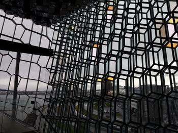 Low angle view of glass window in building