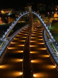 High angle view of illuminated bridge at night