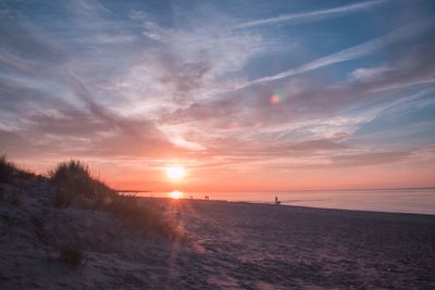 Scenic view of sea at sunset