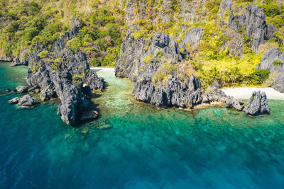 Scenic view of rocks on sea