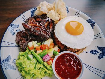 High angle view of food in plate on table