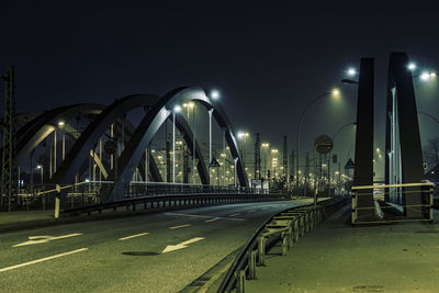 Illuminated street lights at night