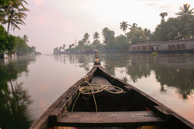 Boat on kerala backwaters against sky