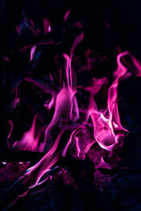 Close-up of bonfire against black background