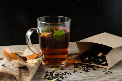 Close-up of tea in glass on table