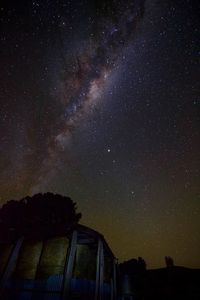 Low angle view of stars against sky at night