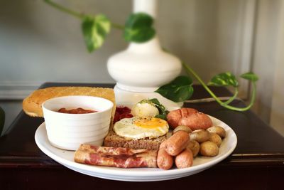 Close-up of breakfast served on table