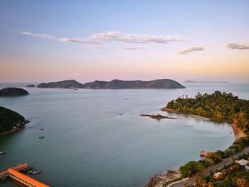 High angle view of sea against sky during sunset