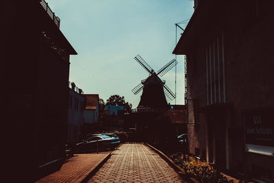 Buildings in city against sky