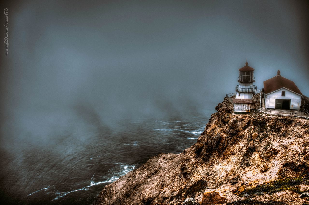 Elevated view of lighthouse in fog