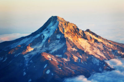 Scenic view of volcanic mountain against sky