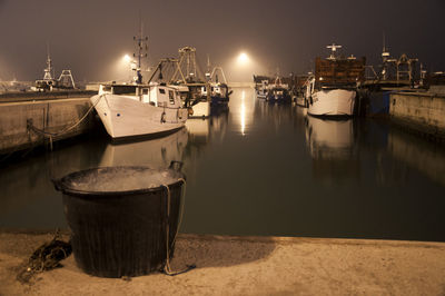 View of harbor at night