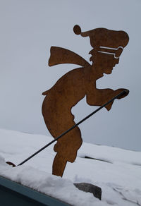 Low angle view of snow against sky