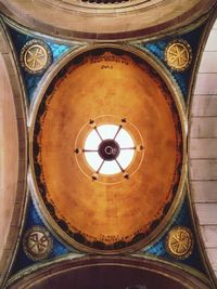 Low angle view of ornate ceiling in historic building