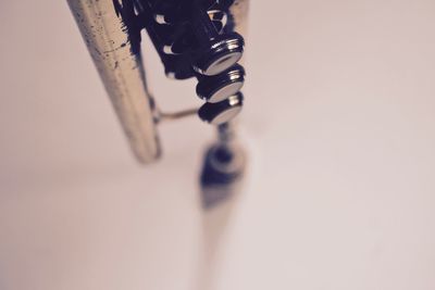 Close-up of musical instrument against white background