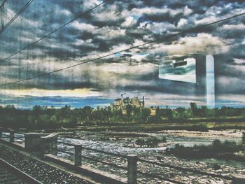 Scenic view of cityscape against sky