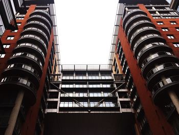 Low angle view of modern buildings against clear sky