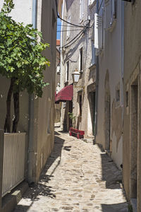 Narrow alley amidst buildings