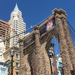 Low angle view of built structure against clear blue sky