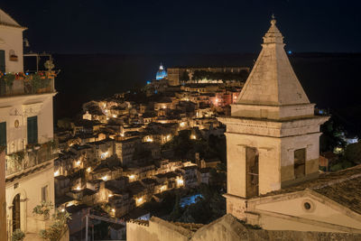 High angle view of illuminated buildings at night