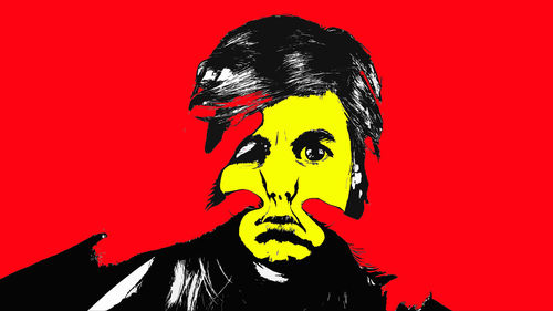 Portrait of man against red background