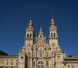 Low angle view of building against blue sky