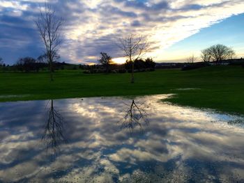 Scenic view of landscape against sky during sunset