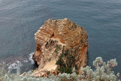High angle view of rock formation on sea shore