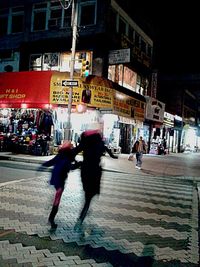 People walking on city street