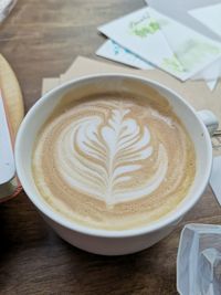 Close-up of cappuccino on table